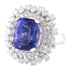 Stamped: 14K White GoldTotal Ring Weight: 13.5 GramsRing Length: N/ARing Width: N/AGemstone Weight: Total Natural Tanzanite Weight is 13.52 Carat (Measures: 14.08x12.10 mm)Color: BlueDiamond Weight: Total Natural Diamond Weight is 2.75 CaratColor: F-G, Clarity: VS2-SI1Face Measures: 26.07x24.32 mmSku: [703584W] Formal Tanzanite Cushion Cut Ring, Cushion Cut Gemstones For Formal Fine Jewelry, Cushion Cut Gemstones With Prong Setting For Formal Occasions, Cushion Cut Fine Jewelry Gemstones For Formal Occasions, Luxury Tanzanite Gemstones For Formal Occasions, Formal Round Cut Tanzanite Gemstones, Formal Multi-stone Cushion Cut Rings, Formal Tanzanite Multi-stone Gemstones, Formal Tanzanite Fine Jewelry Gemstones