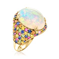 Ross-Simons - Ethiopian Opal, 2.20ct t. w. Multicolored Sapphire Ring in 14kt Yellow Gold. Size 9. The party never stops - at least not when this ring's on your finger! A 16x12mm oval Ethiopian opal cabochon beams its iridescent hues inside a flashy band bedazzled with 2.20 ct. t. w. multicolored sapphire rounds. Crafted in 14kt yellow gold. 3/4" wide. Multicolored sapphire and Ethiopian opal ring. Opal birthstones are the perfect gift for October birthdays. Multicolor Oval Opal Ring For Formal Occasions, Fine Jewelry Oval Multi-stone Opal Ring, Oval Multi-stone Opal Ring Fine Jewelry, Anniversary Ethiopian Opal Multi-stone Ring, Elegant Multicolor Cabochon Opal Ring, Multicolor Oval Cabochon Opal Ring, Luxury Ethiopian Opal Cabochon Rings, Luxury Ethiopian Opal Multi-stone Rings, Yellow Gold Ethiopian Opal Multi-stone Jewelry