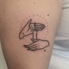 two hands holding each other with stars in the sky above them tattoo design on arm