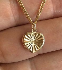 "14K REAL GOLD HEART NECKLACE .REAL 14K GOLD (NOT PLATED OR FILLED).--2.4 GR-- 20\" LONG 14K CURB GOLD CHAIN. 14K GOLD HEART PENDANT . FOR LOVE PENDANT SIZE : 12x12 mm ---MADE IN ITALY-BEST QUALITY--- FREE GIFT BOX NOTE:THIS ITEM IS SHIPPED WITH SIGNATURE CONFIRMATION. CADENA DE CORAZON EN ORO PURO 14K .--2.4 GR-- 20\" LARGO 14K ORO REAL CADENA . CORAZÓN EN ORO REAL 14K. PARA AMOR DIJE: 12x12 mm ---MEJOR CALIDAD-HECHO EN ITALIA--- CAJA DE REGALO GRATIS NOTA:ESTE ARTICULO SERA ENVIADO CON CONFIRM 14k Gold Round Heart Necklace For Valentine's Day, 14k Gold Heart Necklace For Valentine's Day, Yellow Gold Heart Necklace For Valentine's Day, 14k Gold Tarnish-resistant Heart Necklace For Valentine's Day, Valentine's Day Yellow Gold Heart Necklace, Gold Double Heart Necklace Stamped 14k, Heart-shaped 14k Gold Necklace Stamped 14k, Yellow Gold Heart Necklace Stamped 14k, 14k Gold Diamond Cut Heart Necklace For Valentine's Day