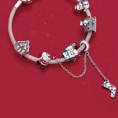 This is charm only, bracelet is sold separately. This festive Santa Claus Christmas safety chain for bracelets is made of high-quality 925 sterling silver and features a charming design of Santa Claus holding a gift sock. Add this delightful accessory to your bracelet collection or give it as a special holiday gift to a loved one. Get into the holiday spirit and show off your love for Santa with this stunning Christmas safety chain! Made with high-quality 925 sterling silver, this chain features Silver Bracelets For Holiday, Silver Bracelet For Holiday, Silver Holiday Bracelet, Silver Charm Bracelet For Christmas, Silver Bracelets For Christmas Festive Season, Silver Christmas Festive Bracelets, Festive Silver Bracelets For Christmas, Silver Charm Bracelets For Christmas, Christmas Charm Bracelet Gift