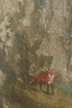 a painting of a red fox on the side of a wall