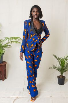 This 2 piece is perfect for all outings. Wear to dates, work, movies, parties and much more. It's so versatile that it will easily suit any occasion. Handmade with 100% African wax cotton 2 side pockets As always all our designs are fully handmade and custom made for you, so you are welcome to request any customisation, including length customisations to petite or tall, adding or removing anything of your choice from the design and even choosing a different fabric.  You are also welcome to send us your measurements if you have them or if you have someone to measure you accurately. Otherwise, just choose your size from our size chart, our sizes are accurate. Please leave a note of your height while ordering so we can use the best length for you.  Also, please feel free to message us for any Fitted Two-piece Set With Notch Lapel, Fitted Matching Set For Workwear, Tailored Two-piece Long Sleeve Set, Tailored Long Sleeve Two-piece Set, Fitted Long Sleeve Printed Pant Set, Printed Long Sleeve Suits For Formal Occasions, Formal Printed Long Sleeve Suits, Formal Long Sleeve Printed Suit, Printed Notch Lapel Blazer For Work