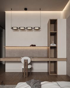 a bedroom with a bed, desk and shelves on the wall next to each other