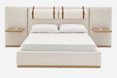 a bed with white linens and wooden headboard, made to look like it is in the middle of a room