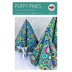 the cover of puffy pines magazine features two colorful towels and a faucet