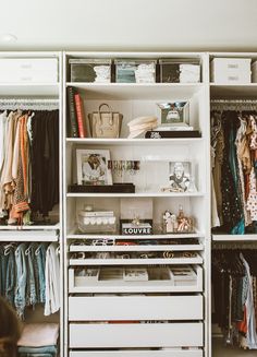 an organized closet with clothes and other items