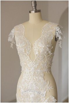 Beautiful Off-white sequin flower lace trim for exclusive and luxury wedding dresses  ❀❀ SAMPLE SWATCHES❀❀ If you want to check the color and quality, you can order a swatch here (READ DESCRIPTION OF THE LISTING  https://www.etsy.com/listing/733242442/sample-swatch-please-read-description?ga_search_query=sample&ref=shop_items_search_1&crt=1 Please note, that it can happen, that till you get your lace sample with air mail, the lace could be sold in this time.   Perfect for dress making, bridal we Fitted Cream Lace With Lace Patchwork, Fitted Cream Lace With Patchwork Detail, Fitted Lace Wedding Dress With Lace Bodice, White Fitted Lace Wedding Dress, Fitted Wedding Lace With Lace Back, Fitted Lace Back Dress For Weddings, White Fitted Wedding Dress With Delicate Lace, Fitted Cream Lace Wedding Dress, Cream Fitted Wedding Dress With Lace Trim