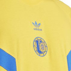 You'll boldly show you're a fan in the adidas Tigres Culturewear Men's Tee. And whether you're chilling with the crew or at home rooting loudly, you'll remain comfortable in this lightweight, relaxed-fit shirt. The short sleeves are perfect for those summer days, but you can even layer it to make your staple fan wear all year.Features: Screen printed graphics. Short-sleeved. Crew neck. Details: Fabric: 100% Cotton. Officially licensed. Neck Details, Soccer Shop, Adidas Tee, Black And White Sneakers, Backpack Sport, Shop Fans, Short Jacket, A Fan, Work Boots