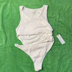 White Beautiful Cutout Suit. Never Worn, New W Tags One-piece Beachwear Top For Poolside, Fitted Tank Top For Beach Vacation, Fitted Summer Top For Poolside, One-piece Stretch Tops For Swimming, Stretchy Beach Top, Casual Summer Tank Top With Lined Body, Beach Fitted Tank Bodysuit, Stretch Beachwear Tops For Sunbathing, Fitted Beachwear Tank Top For Beach