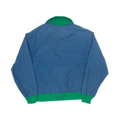 Item is in good used condition. >Size: L >Armpit To Armpit: 24" >Armpit To Cuff: 19" >Collar To Hem: 25" Casual Blue Windbreaker For Streetwear, 90s Style Blue Outerwear For Streetwear, 90s Style Blue Track Jacket For Streetwear, 90s Style Blue Track Jacket For Outdoor, Blue Cotton Windbreaker With Pockets, 90s Cotton Windbreaker For Outdoor, 90s Style Blue Windbreaker With Pockets, 90s Blue Track Jacket For Streetwear, 90s Style Hooded Blue Windbreaker