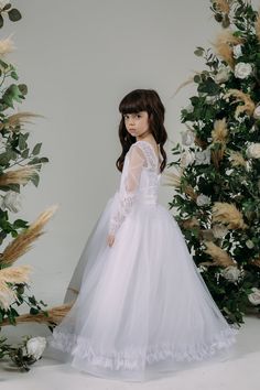 Long Sleeve Tulle Dress For Confirmation, Elegant Long Sleeve Princess Dress For First Communion, Long Sleeve Tulle Princess Dress For First Communion, Tulle First Communion Dress With Lace Trim, White Lace First Communion Dress For Debutante Ball, Lace First Communion Dress With Lace Sleeves For Confirmation, Baptism Dress With Lace Sleeves For First Communion, First Communion Long Sleeve Dress With Lace Bodice, Long Sleeve Tulle First Communion Dress