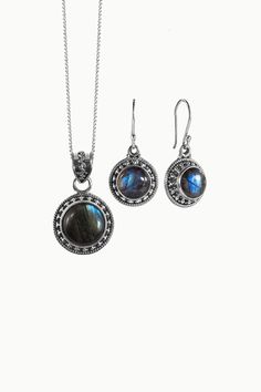 Aurora is a stunning earrings and necklace jewelry set featuring round cushion cut Labradorite gemstones nestled inside a finely detailed, sterling silver frame. Amalfi jewelry set is the perfect pick-me-up when you need that extra sparkle with it's ethereal, vintage-inspired design in silver. A highly mystical and protective stone, labradorite opens the imagination and raises consciousness. Aids in connecting one to universal energies, and deflects unwanted negative energies. Promotes self disc Sterling Silver Gemstone Necklace, Himalayan Quartz, Pear Pendant, Raw Emerald, Round Cushion, Moonstone Crystal, Silver Anklets, Vintage Inspired Design, Stunning Earrings