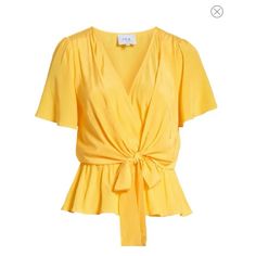 -16 1/2" Length -Front Tie Closure -Surplice V-Neck -Short Sleeves -Ties In Front -100% Viscose Vibrant Yellow Hue Perfect For Summer!! Elegant Yellow V-neck Top, Yellow V-neck Blouse For Spring, Chic Mustard Short Sleeve Top, Chic Mustard Tops For Spring, Chic Yellow Short Sleeve Tops, Chic Yellow Blouse For Day Out, Elegant Yellow Tops For Summer, Elegant Yellow Summer Tops, Gold V-neck Summer Blouse