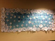 a bulletin board with snowflakes on it