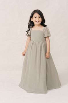 Our sweet Maeve Chiffon dress is now a fabulous option for your littlest one! This chiffon dress features sheer puff sleeves that can be worn off or on the shoulder showing off the trending square neckline and a full skirt providing a simple, but timeless design. Model Mia; Size: 4T / Length: Regular, Age: 4, Height: 3’5Model Marleese; Size: 4T / Length: Regular, Age: 5, Height: 3'8 FEATURES: Square neckline Sheer Puff sleeves with elastic Slightly empire waist Tulle under skirt for added volume Wedding Eucalyptus, Wedding Parties Colors, Under Skirt, Bridesmaid Dress Colors, Dress Home, Pink Summer, Boho Summer, All Things Wedding, Size 4t