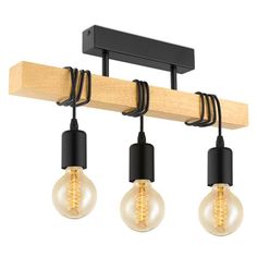 three light bulbs hanging from a wooden beam with black cords and lights on the end