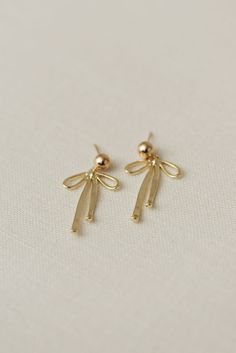 Rumor has is that 2024 is the year of BOWS! These super cute, dangly bow earrings will be the HIT of any party. Includes two gold or silver-plated dangly bow charms 6mm 14k gold-filled or sterling silver, hypoallergenic ball studs Choose from either solid or sparkly Samantha Core, Jewellery Aesthetic, Summer Wishlist, Everyday Wear Jewelry, Spring Inspo, Bow Accessories, Random Ideas, Pretty Jewelry, Bow Earrings