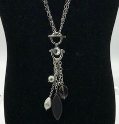 Gorgeous silver tone with beads, crystal, pearl, rhinestone charms necklace by Lia Sophia, black, gray, tassel. Elegant Metal Necklaces With Dangling Charms, Silver Charm Necklaces With Pearl Charm, Elegant Silver Metal Tassel Necklace, Silver Beaded Dangle Charm Necklaces, Silver Metal Tassel Necklace, Silver Long Tassel Necklace, Elegant Beaded Dangle Charm Necklaces, Sophia Black, Charms Necklace