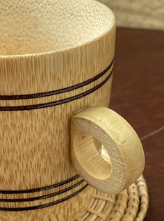 a close up of a wooden object on a table