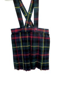 Traditional British Girls plaid pleated skirt with button suspenders Lord & Taylor size age 4-6 PLEASE check measurements. bottle green, yellow, blue and black plaid. waist 20 inches waist to hem 24 inches button suspenders that can be removed. button side and zipper closure 20% Wool.80% acrylic hand wash. I am happy to answer questions and combine shipping where possible.  All items are from a smoke free pet free home and ready to ship. Skirt With Suspenders, British Girls, Backing A Quilt, Button Suspenders, Tartan Skirt, Plaid Pleated Skirt, Taylor Made, Girls Skirt, Skirt With Buttons