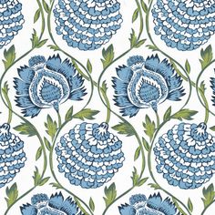 a blue and green flower pattern on white fabric, with large flowers in the center