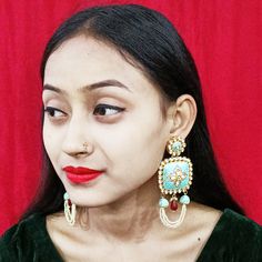 These are a beautiful pair of Earrings, made with beautifully white beaded Kundan. These earrings work well with all types of clothing, whether it be formal attire or a casual party. Eye-catching and unique jewellery that will set you apart. Gift this piece to a loved one, and see their face light up with joy. Best for gifting or for personal use, wear it to any occasion and be in the spotlight. Elegant Dangling Beads Earrings For Festivals, Elegant Dangling Beaded Earrings For Festivals, Elegant Beaded Earrings With Dangling Beads For Festivals, Festive Beaded Drop Earrings For Wedding, Festive Meenakari Beaded Earrings For Celebration, Traditional Green Beaded Earrings For Party, Traditional Bridal Earrings With Dangling Beads For Party, Traditional Bridal Earrings With Dangling Beads, Festive Dangling Beads Earrings For Celebration