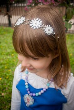 DIY Frozen snowflake headband for your little Elsa. Just print this download onto Shrinky Dink shrink film, cut, bake, and glue to a headband. Perfect for a Frozen birthday party or Elsa Halloween costume!