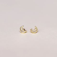 gold moon stud earrings by jaxkelly Dainty Moon Phase Earrings, Dainty Half Moon Charm Earrings, Dainty Half Moon Earrings With Moon Charm, Dainty Moon-shaped Earrings, Dainty Moon-shaped Moon Phase Earrings, Minimalist Gold Cartilage Earrings With Moon Charm, Gold Minimalist Cartilage Earrings With Moon Charm, Minimalist Yellow Gold Earrings With Moon Charm, Gold Crescent Cartilage Earrings