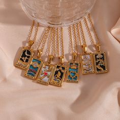 These stunning and colorful tarot card necklaces are as beautiful as they are magical. Wear them to manifest the meaning of each card. ﻿BUY 2 GET 1 FREE! Pendant Size: 19mm*11mm Material: 18K Gold Plated over Stainless Steel. Finished with anti-tarnish processing (allergic skin safe + nickel and lead-free). Does not tarnish. Luxury Gemstone Amulet Jewelry, Cheap Spiritual Locket Necklace, Luxury Red Amulet Necklace, Necklaces On Playing Cards, Tarot Card Necklace, Knight Of Cups, Card Necklace, Inner Guidance, Amulet Necklace