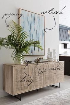 a plant is sitting on top of a cabinet in a room with white walls and flooring