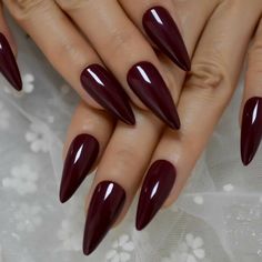 Press on Nails: Color: Maroon Dark Red Shape: Medium Stiletto  Quantity: 24 Nails Comes with 24 Nails, Nail Glue, Mini Nail File, Mini Nail Buffer, Mini Cuticle Pusher (Orange wood stick) and Alcohol pad. How to Apply:  1. Clean hands and your natural nails ( you can use alcohol pad included).  2. File and Buff natural nail gently. 3. Apply nail glue or glue sticker to the plastic tip. 4. Apply plastic tip to the natural nail. 5. Press the tip and hold down for 30 sec, avoid contact with water f Designed Nails, Maroon Nails, Long Press On Nails, Finger Nails, Nails Square, Party Nails, Nails Polish, Round Art, Nails Almond