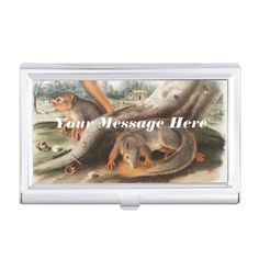 a business card case with two small animals on the front and one large animal on the back