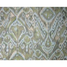 an upholstered wallpaper pattern in green and blue tones with grey, white, and light brown colors