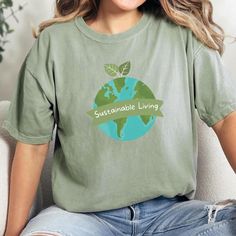 Title: Eco Warrior T-Shirt | "Green Choices, Happy Planet" | Sustainable Living Tee | Organic Cotton Description: 🌿 Join the green revolution with our "Green Choices, Happy Planet" Eco Warrior T-Shirt! Perfect for environmentally conscious individuals who want to make a statement and inspire change. Why You'll Love This Shirt: * Empowering design that showcases your commitment to sustainable living * Made from 100% organic cotton for ultimate comfort and eco-friendliness * Versatile for everyday wear, environmental events, or casual outings * A conversation starter that spreads awareness about green living Features: ✅ Available in multiple sizes (XS-3XL) ✅ Choose from Earth-inspired colors ✅ Durable, eco-friendly print that won't fade after washing ✅ Plastic-free packaging How to Order: S Casual Tops With Earth Day Screen Print, Letter Print Crew Neck Top For Earth Day, Casual Screen Print Tops For Earth Day, Earth Day Short Sleeve Top With Letter Print, Relaxed Fit Letter Print Tops For Earth Day, Green Casual Tops For Earth Day, Eco-friendly Ink Tops With Relaxed Fit And Short Sleeves, Green Cotton Shirt With Text Print, Casual Crew Neck T-shirt With Eco-friendly Ink