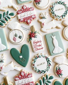 many decorated cookies are arranged on a table