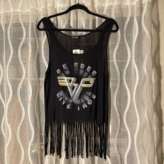 A Brand New Tank Top Very Cute With Black Fring. Reads “Be Free, Live True” In A Van Halen Look Logo. Never Worn. Casual Fringe Tops For Night Out, Trendy Black Tank Top For Festival, Black Summer Tops For Music Festival, Black Casual Tank Top For Festivals, Black Tops For Summer Music Festival, Casual Black Tank Top For Festivals, Black Sleeveless Top For Music Festival, Black Tops For Music Festival In Spring, Black Top For Spring Music Festival