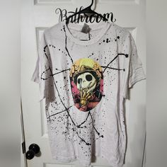 Brand New Freddy Halloween Shirt In Large. Comes From A Smoke-Free Home. White Graffiti Print Tops For Halloween, White Grunge Tops With Skull Print, Casual White Shirt For Halloween, White Grunge Tops For Halloween, Halloween White Shirt With Skull Print, Spooky White Tops For Streetwear, Spooky White Graphic Print Top, White Spooky Tops For Streetwear, White Shirt With Halloween Sublimation Print