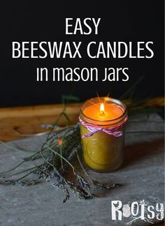 an easy beeswax candle in mason jars with text overlay that reads, easy beeswax candles in mason jars