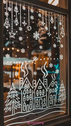 Transform your ordinary window into a magical winter wonderland with this easy DIY project. This charming scene, featuring snow-capped houses, twinkling stars, and festive bells, will bring a touch of holiday cheer to your home. Perfect for spreading joy and creating a cozy atmosphere. #ChristmasDecor #DIYChristmas #WinterDecor #HolidaySeason #WindowArt #ChristmasIdeas #WinterVibes #FestiveHome #DIYProjects #HomeDecor #WinterWonderland #Snowflakes #ChristmasLights #BellDecorations #CozyHome #WinterFun #HolidayCheer #ChristmasSpirit #DIYInspiration #HomeImprovement #HolidayTips Christmas Window Painting Houses, Paint Pen Window Art Christmas, Window Paint Snowflakes, Boutique Holiday Window Display, Window Snowflakes Diy, Winter Wonderland Window Display Ideas, Xmas Windows Display, Christmas Window Cricut, Happy Holidays Window Art