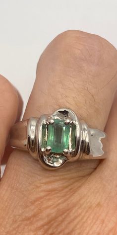 Vintage genuine green emerald ring wedding engagement 925 sterling silver Size 5 or 7 can be sized by my jeweler. His service charge is $10-$20 All rings are shipped in a nice gift box. Check out our over a THOUSAND great reviews Engraving is $4 per letter and is not always perfect depending on the piece. It can take a few days if the jeweler is busy. This is payable to Paypal Judithsltd@gmail.com Emerald Ring Vintage Silver, Silver Vintage Rings Engagement, Formal Green Birthstone Ring With Accent Stones, Silver Emerald Ring With Accent Stones For Formal Events, Silver Emerald Ring With Accent Stones For Formal Occasions, Vintage Engagement Rings Green, Classic Green Emerald Ring With Accent Stones, Formal Emerald Ring With Accent Stones For May Birthstone, Emerald Cut Birthstone Ring In Sterling Silver As Gift