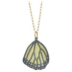 A true Rebecca Myers Design signature piece, our monarch butterfly wing designs are modeled after nature's masterpiece and hand crafted with the highest quality materials. Oxidized sterling silver is layered over 18k yellow gold, with sparkling pave set white diamonds at the bottom. The pendant hangs from a 16-inch 14k gold cable chain (other lengths available upon request; possibly subject to a price change.) This pendant design is also available in a smaller size. Check out our storefront to s Wing Necklace, Wings Design, Butterfly Wing, Nature Inspired Jewelry, Baltimore Md, Inspired Jewelry, Fine Jewelry Designers, Monarch Butterfly, Pendant Design