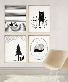 four black and white prints are hanging on the wall