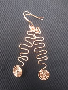 This listing is for 1 pair of copper spiralling earrings. Choose the style that suits our mood. Thank You. Peace and Love. Spiral Wrap Earrings As Gift, Rose Gold Copper Wire Earrings As Gift, Nickel Free Rose Gold Copper Wire Earrings, Rose Gold Spiral Earrings With Ear Wire, Spiral Copper Wire Earrings As Gift, Nickel-free Copper Earrings For Festival, Spiral Copper Wire Jewelry With Ear Wire, Spiral Rose Gold Copper Jewelry, Traditional Copper Nickel-free Earrings