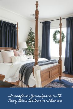 a bedroom decorated for christmas with navy blue drapes and white bedding in the corner