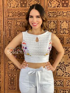 This modern style Two Piece Jumpsuit with a traditional Mexican look is the perfect outfit to add to your wardrobe. It has beautiful hand embroidered flowers, embroidered with Silk Thread and lace details on the Top. The top and pants both have elastic in the back for an adjustable fit. This outfit is made with love by Mexican Artisans in Oaxaca, Mexico. Note: It comes in one size which fits sizes Small and Medium. More colors available here: https://www.etsy.com/es/listing/979071376/jumper-mexi Fitted Cotton Sets With Geometric Embroidery, Fitted Summer Embroidered Top With Geometric Design, Fitted Embroidered Top With Geometric Design For Summer, Fitted Summer Embroidered Top With Geometric Embroidery, Fitted Summer Top With Geometric Embroidery, Fitted White Blouse With Geometric Embroidery, Fitted Sleeveless Tops With Geometric Embroidery, Fitted Sleeveless Top With Geometric Embroidery, Flowers Embroidered