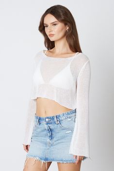 The Jennifer White Knit Crop Top is a must-have for the season! White sheer knit forms a boat neckline that can be worn on or off the shoulder, and long bell sleeves. Style over a bralette or your favorite bikini for a fun coverup look! DETAILS & CARE Acrylic. Machine wash cold. Imported. Crochet Boat, Jennifer Black, Open Weave Sweater, Bell Sleeve Crop Top, Sheer Knit, Crop Top Outfits, Open Knit Sweater, Pink Boho, Knit Crop Top