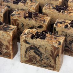 several soap bars with coffee beans on them