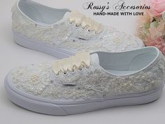 "Beautiful and Romantic wedding sneaker are a perfect accessories for your Special day..These Wedding White Authentic Vans Sneakers , are embellished with Ivory Lace fabric and Ivory applique . White Satin Ribbon shoe lace for tying ... Handmade to order, so please allow me enough time before your wedding date. Orders are processed and shipped within 5-6 WEEKS of payment., large orders may take longer ..Please allow an additional 2-5 days. Domestic Shipping will take 2-5 Business days. This Item Cream Wedding Shoes With White Laces, Lace-up Wedding Shoes With Laces, Round Toe Wedding Shoes With Laces, Round Toe Lace Wedding Shoes, Low-top Wedding Shoes With White Laces, White Sneakers With Laces For Bridal Shower, Cream Lace-up Wedding Shoes For Ceremony, Elegant Low-top Wedding Sneakers, Elegant Low-top Sneakers For Wedding