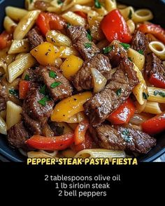 a bowl filled with pasta and meat on top of a table